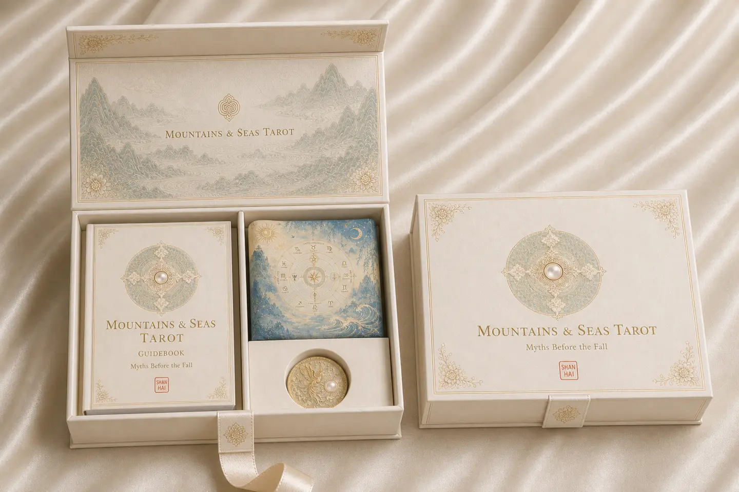 Opened Mountains and Seas Legends Tarot presentation box with guidebook, card deck, and Decision Coin